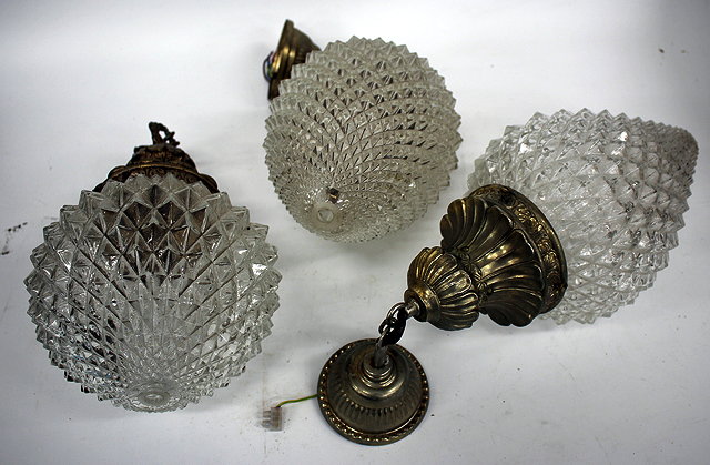 Appraisal: THREE MINT TH CENTURY MOULDED GLASS LIGHT FITTINGS of cone