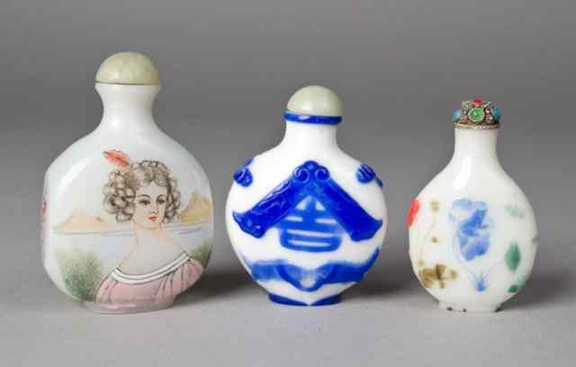 Appraisal: Chinese Glass Snuff BottlesOne in opaque white glass painted on