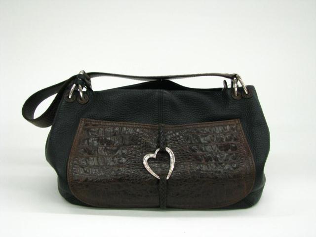 Appraisal: Brighton Black and Brown Leather Purse with heart medallion and