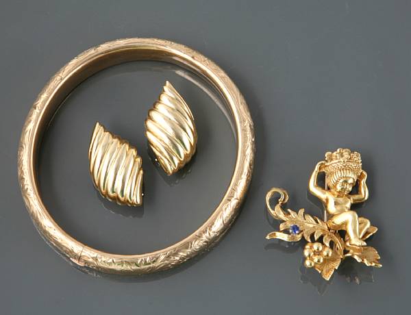 Appraisal: A pair of k gold ear-clips and bangle with k