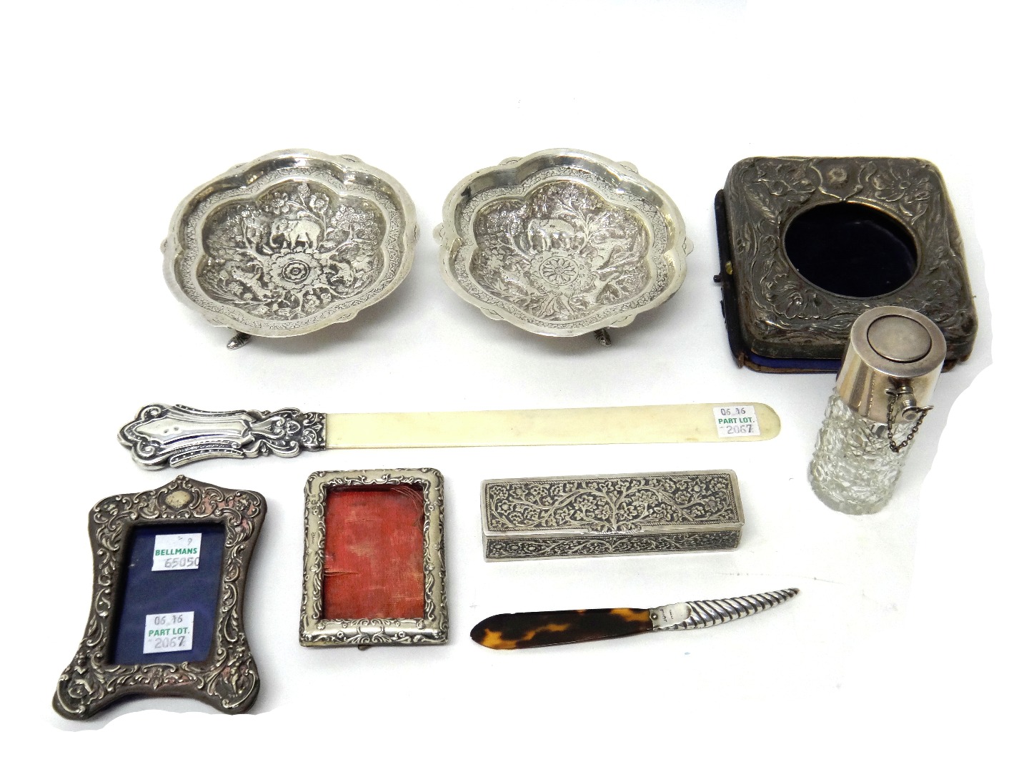 Appraisal: Silver and silver mounted wares comprising a shaped rectangular photograph