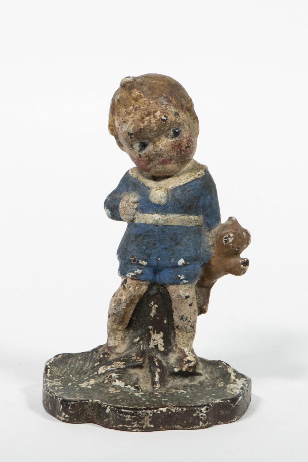 Appraisal: ALBANY FOUNDRY BOY WITH TEDDY BEAR DOORSTOP Early th c