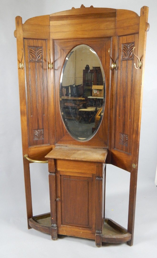 Appraisal: A Belgian Art Nouveau mahogany hall stand the oval bevelled