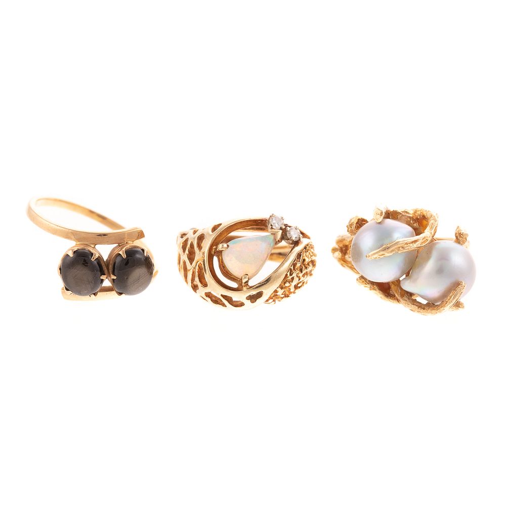 Appraisal: A Trio Gold Rings in Pearl Opal Star Sapphire K