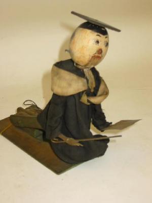 Appraisal: An articulated Schoolmaster puppet wood and wire construction levers and