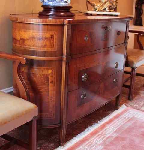 Appraisal: A CONTINENTAL STYLE BURR WOOD AND WALNUT OVAL BUREAU the