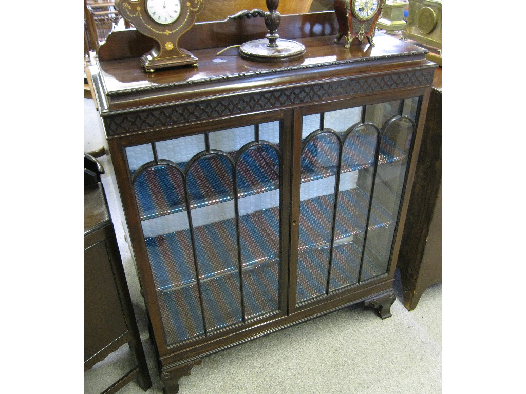 Appraisal: Mahogany display cabinet with blind fret decoration