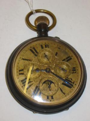 Appraisal: A LARGE GUNMETAL CALENDAR TOP WINDER POCKET WATCH the lever