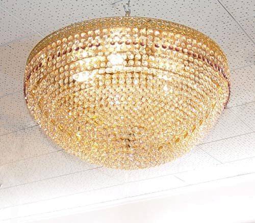 Appraisal: CRYSTAL HUGGER TYPE CHANDELIER tiers light ceiling hugging chandelier high