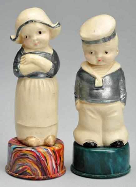 Appraisal: Lot of Dutch Boy Girl Figural Tape Measures Description German