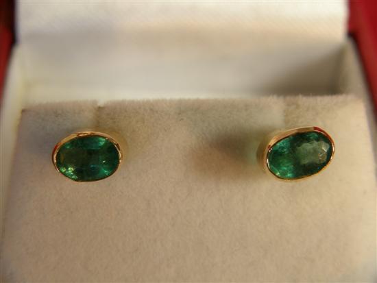 Appraisal: carat gold oval emerald ear studs