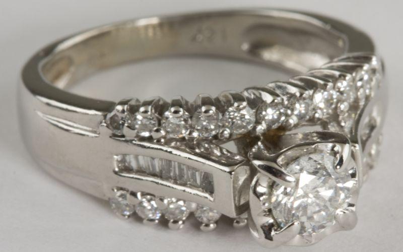 Appraisal: KT White Gold and Diamond Ring centering on one round