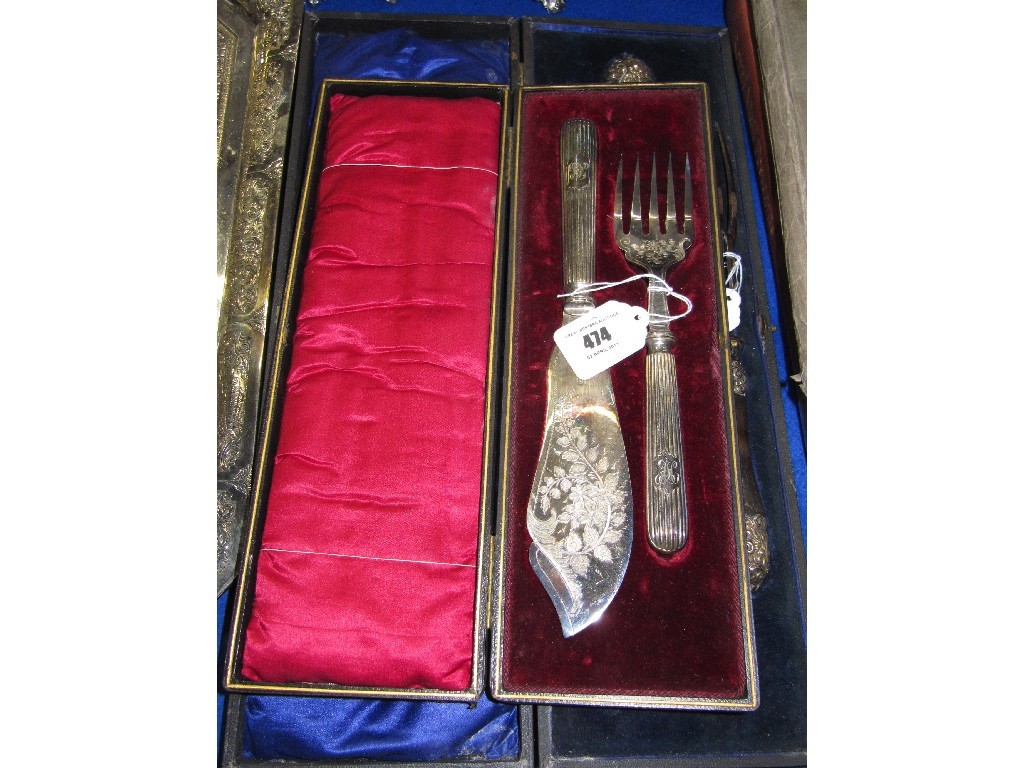 Appraisal: Lot comprising cased carving set and cased fish servers