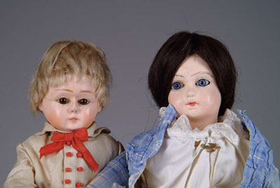 Appraisal: TWO OLD COMPOSITION DOLLS Each with stationary glass eyes One