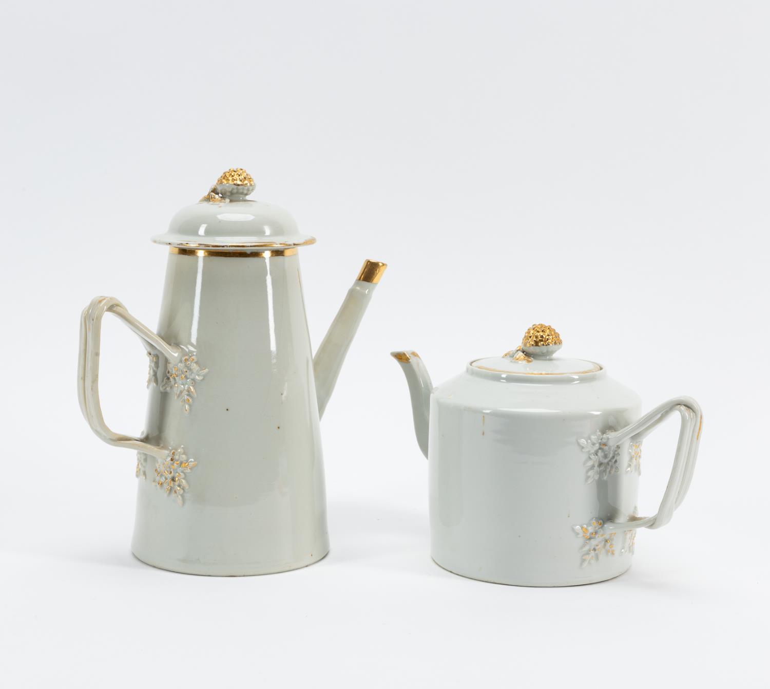 Appraisal: CHINESE EXPORT WHITE PORCELAIN COFFEE TEAPOTS Two piece Chinese Export