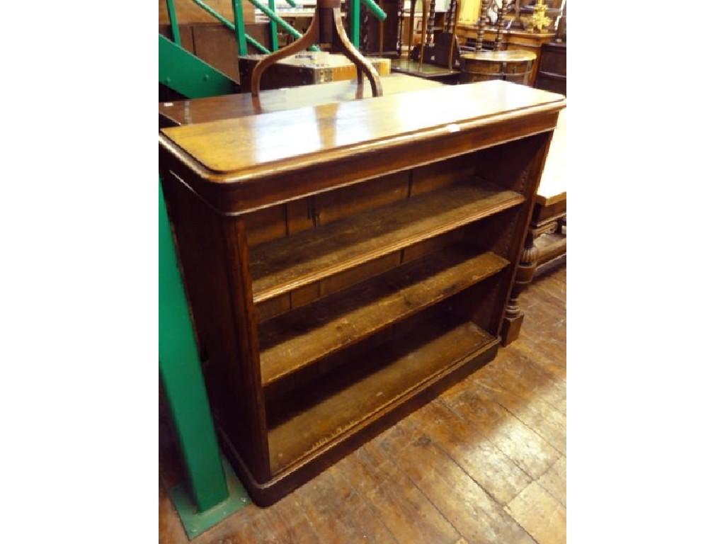 Appraisal: A Victorian oak freestanding open bookcase enclosing two adjustable shelves