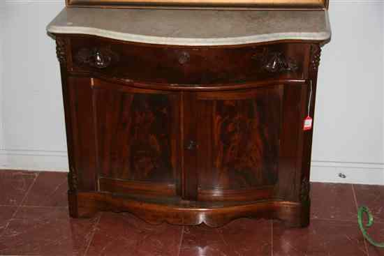 Appraisal: AMERICAN VICTORIAN MAHOGANY MARBLE-TOP BOWFRONT ONE-DRAWER TWO-DOOR SIDE CABINET Grey-veined