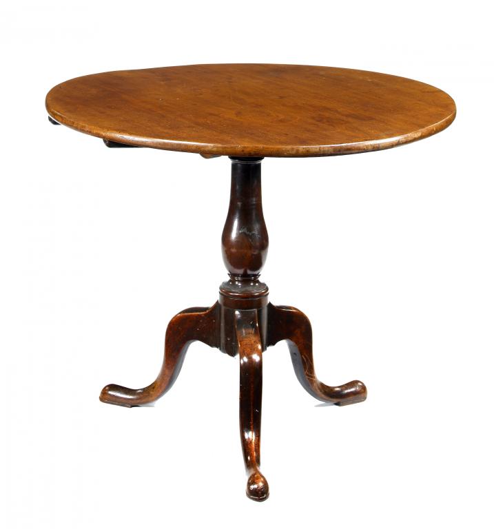 Appraisal: A GEORGE III MAHOGANY TRIPOD TABLE the circular top on