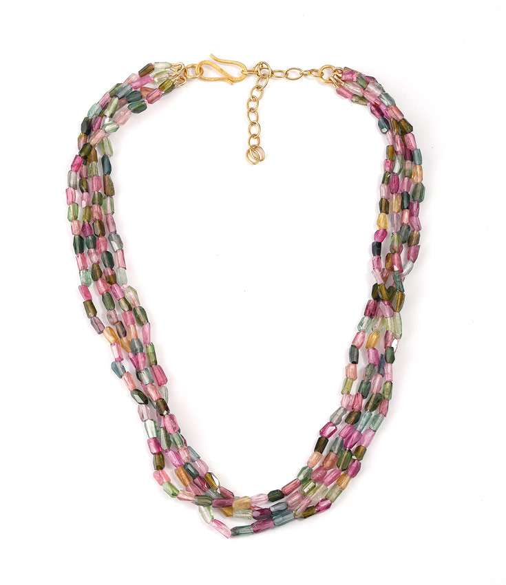 Appraisal: STRAND TOURMALINE NECKLACE Four strands of irregular shaped faceted tourmaline