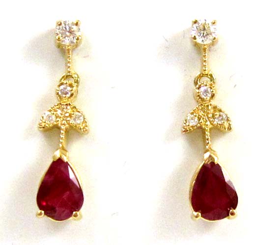 Appraisal: PAIR OF RUBY AND DIAMOND EARRINGS each dangle earrings is