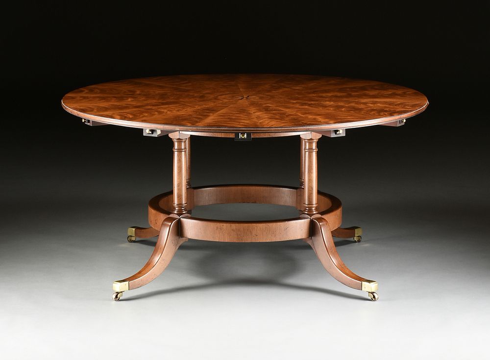 Appraisal: A REGENCY STYLE FLAME MAHOGANY AND PARQUETRY INLAID CIRCULAR DINING