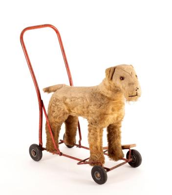 Appraisal: A toy push-a-long mohair dog by Pedigree Soft Toys Ltd