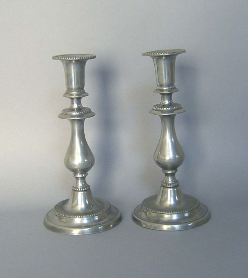 Appraisal: Pair of English pewter candlesticks th c h Provenance Collection