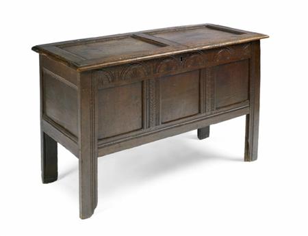 Appraisal: A Charles II oak coffer the twin panel hinged lid