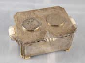 Appraisal: An Art Deco silver casket with ivory handles and feet