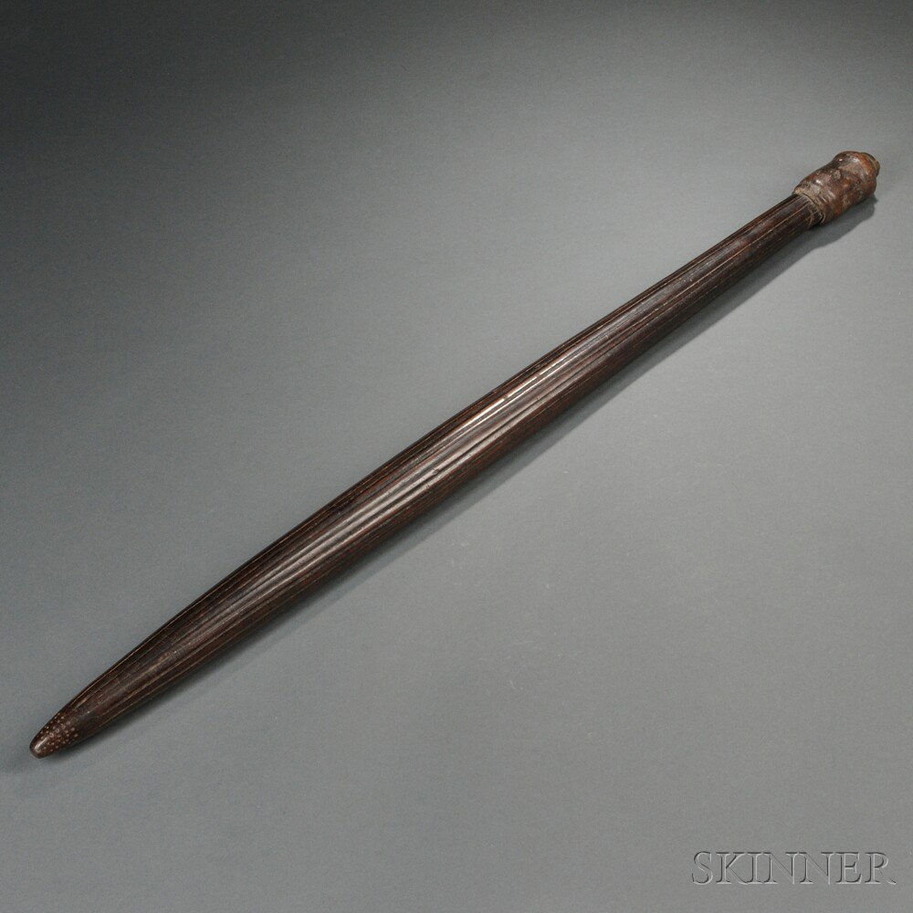 Appraisal: African Carved Wood Throwing Club Dinka with fluted surface hide-covered