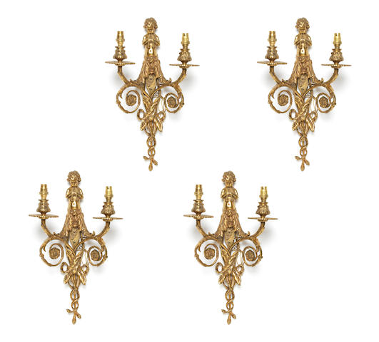 Appraisal: A set of four Louis XV style brass twin branch