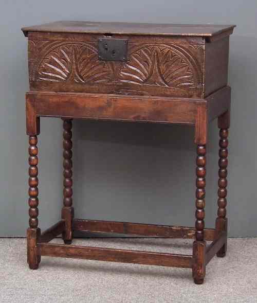 Appraisal: A th Century oak bible box with carved throughout ins