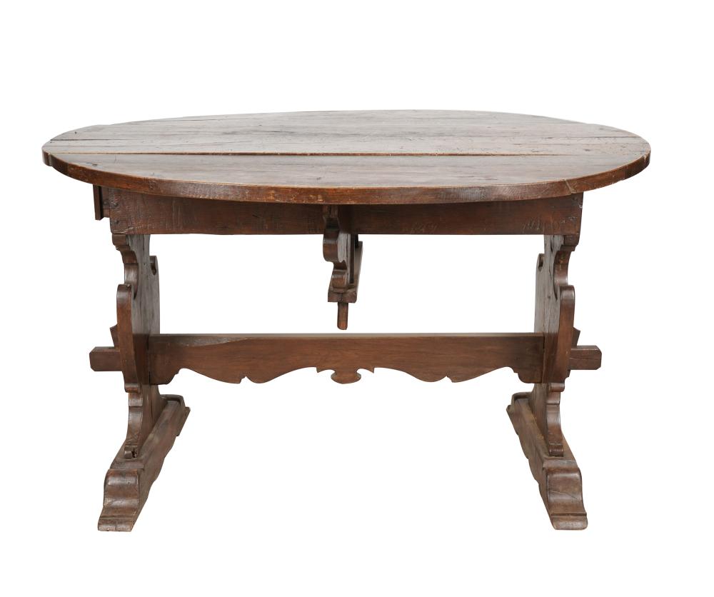 Appraisal: ITALIAN BAROQUE-STYLE DROP LEAF TRESTLE TABLEwalnut with one drawer inches