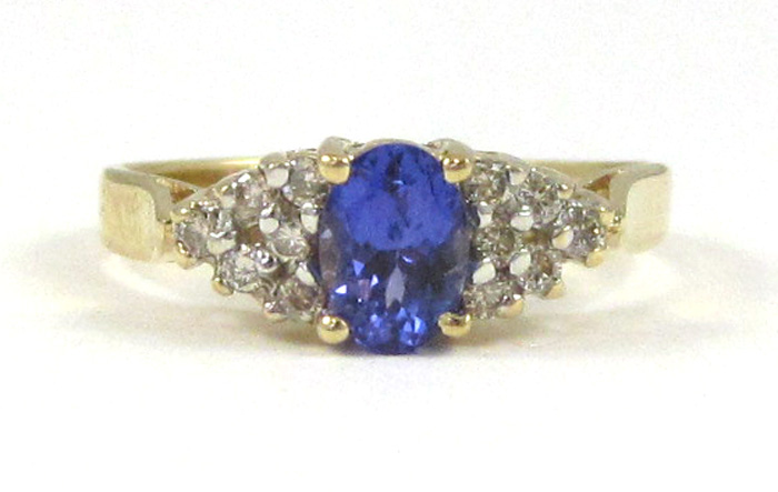 Appraisal: TANZANITE DIAMOND AND FOURTEEN KARAT GOLD RING with six round-cut