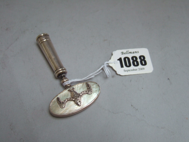 Appraisal: A Dutch silver and mother of pearl corkscrew the oval