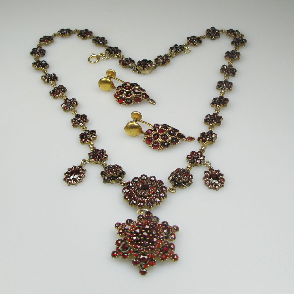 Appraisal: Silver Gilt Necklace set with numerous cut garnets with a