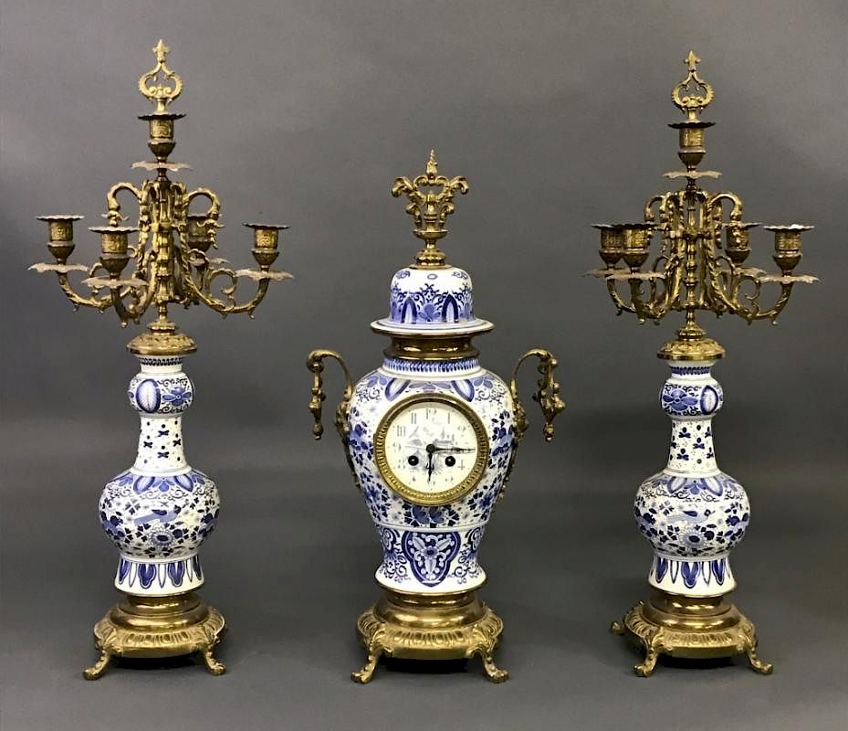 Appraisal: Urn Form Delft Porcelain Clock and Candelabra Urn form Delft