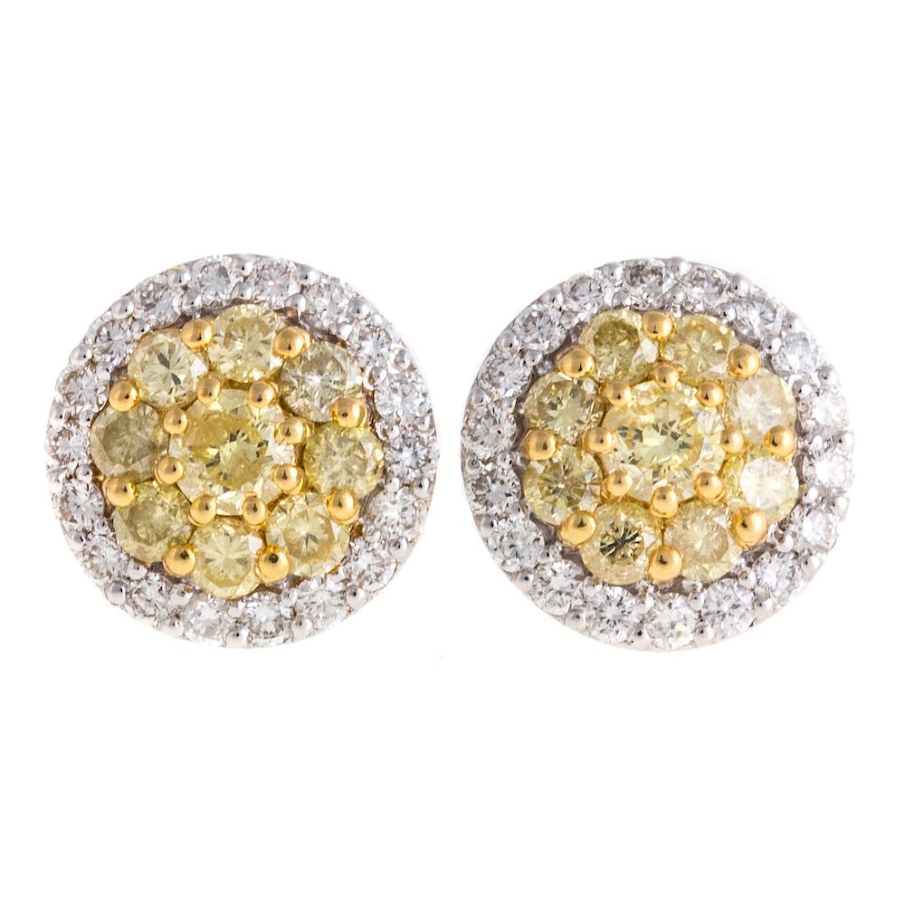 Appraisal: A Pair of Yellow and White Diamond Studs in K