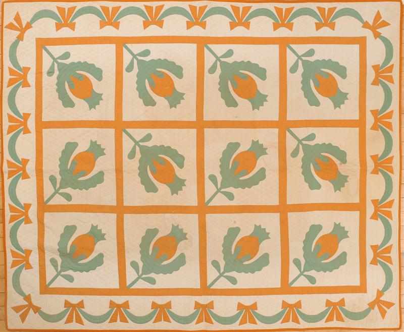 Appraisal: PAIR OF PIECED COTTON QUILTS Worked with saffron and green