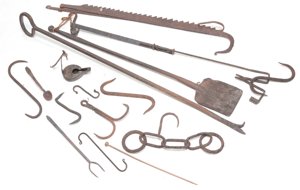 Appraisal: AMERICAN WROUGHT IRON UTENSILS Nineteenth century Including hooks stokers chain