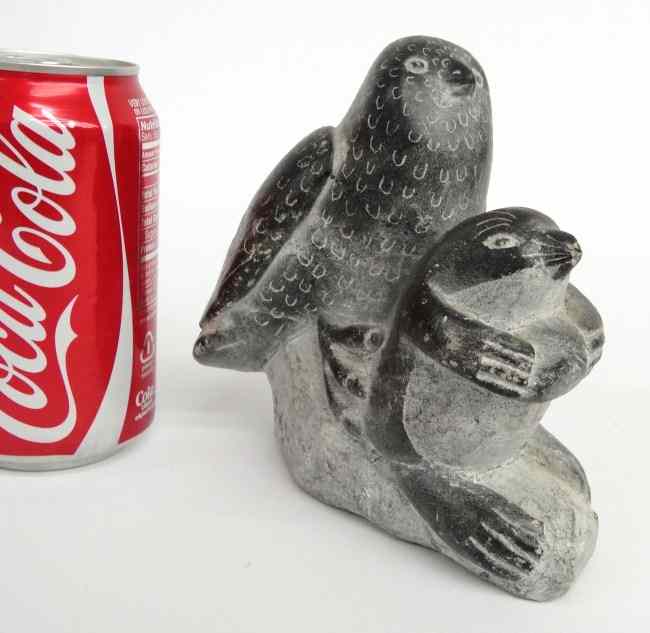 Appraisal: Inuit Eskimo Stone Sculpture hawk and seal Marked underside ''