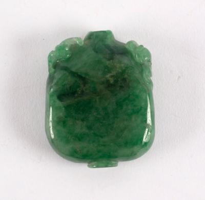 Appraisal: A Chinese jadite snuff bottle of rectangular section carved with