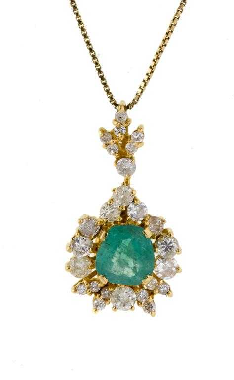 Appraisal: AN EMERALD AND DIAMOND CLUSTER PENDANT the irregular cushion shaped