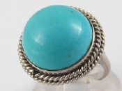 Appraisal: A white metal tests carat gold turquoise ring turquoise approx