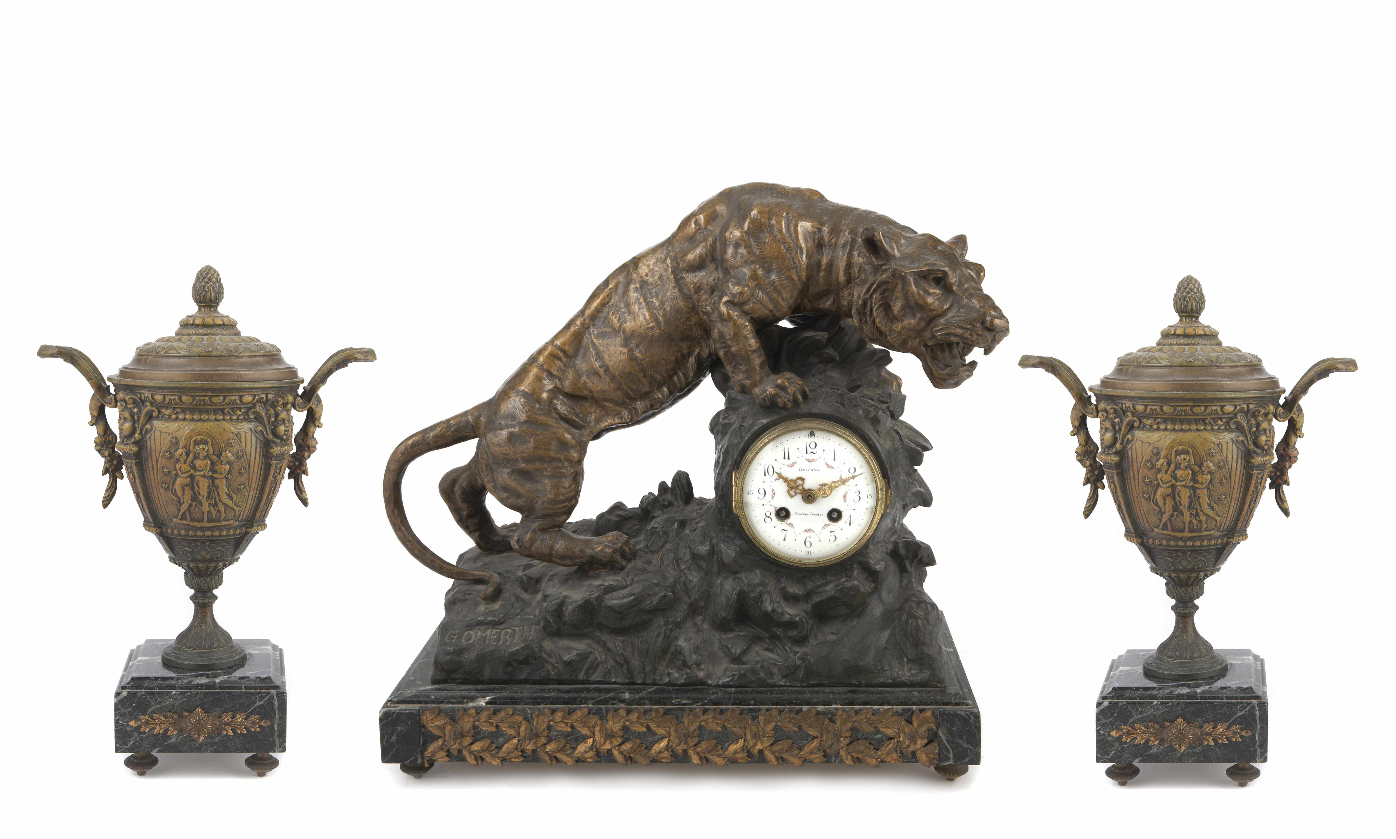 Appraisal: A gilt and patinated metal and marble clock garniture height