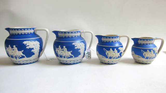 Appraisal: COPELAND SPODE SPRIGWARE PITCHERS in the manner of Jasperware having