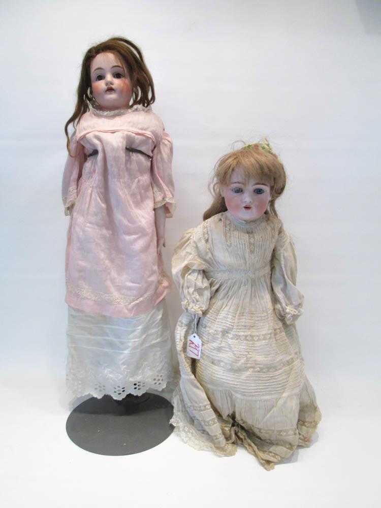 Appraisal: TWO GERMAN BISQUE HEAD DOLLS by Kestner socket head doll