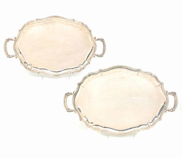 Appraisal: A set of two graduated Italian standard silver tea trays