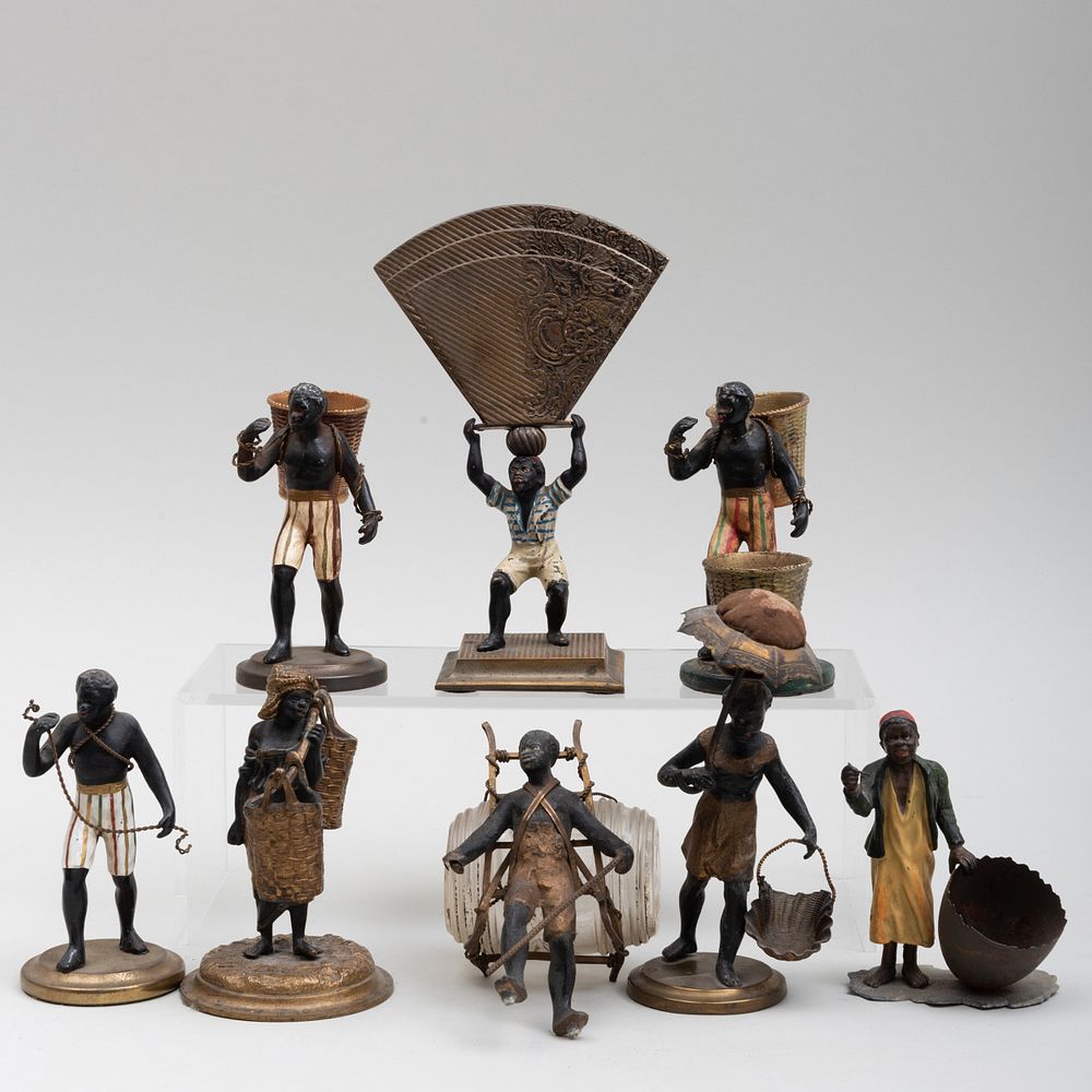 Appraisal: Group of Eight Cold Painted Nubian Table Ornaments The largest