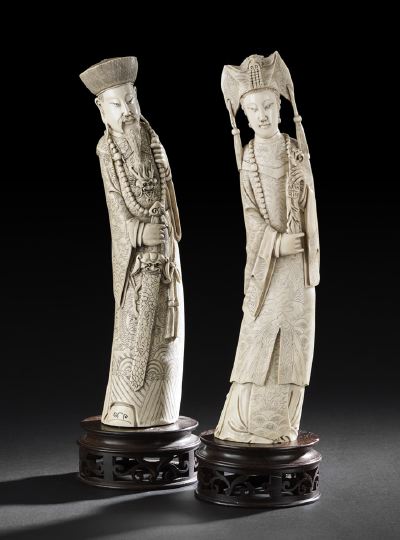 Appraisal: Pair of Chinese Carved Ivory Figures of an Official and